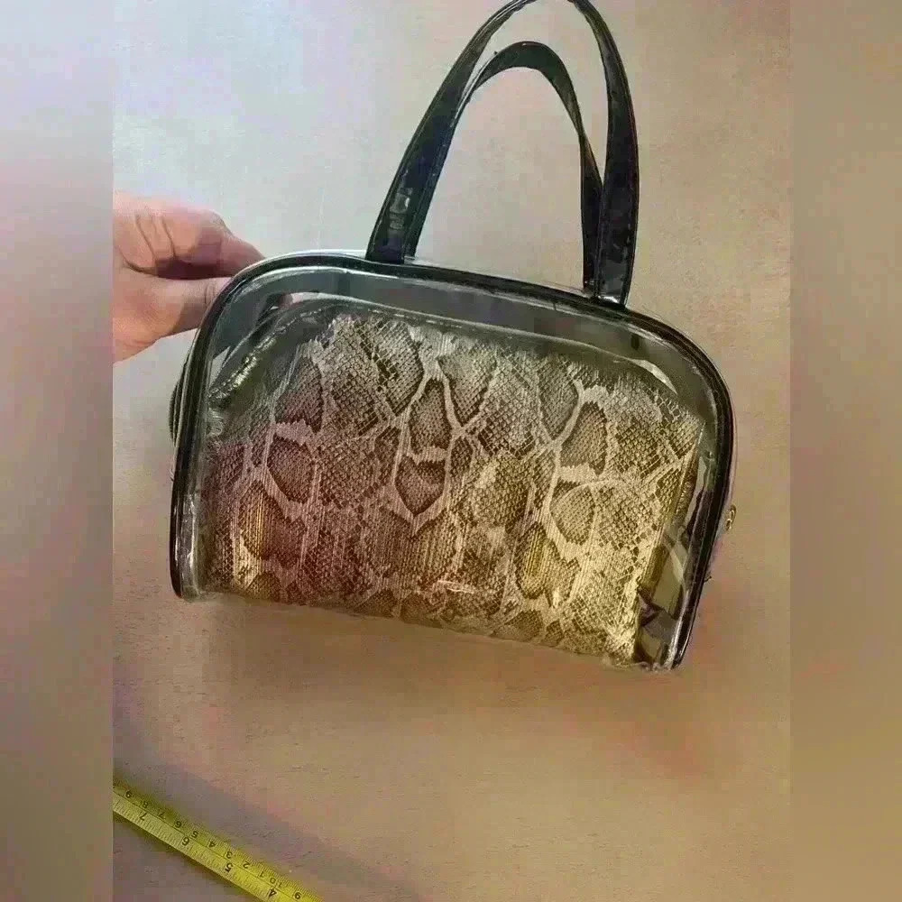 Vince Camuto handbag, three pieces.